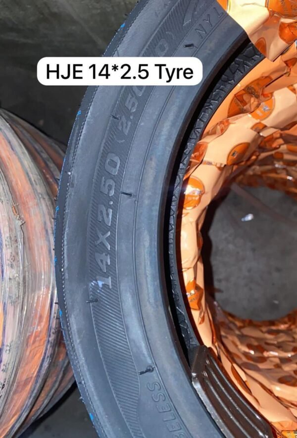Black HJE 14*2.5 scooter tire with aggressive tread pattern for high-speed performance