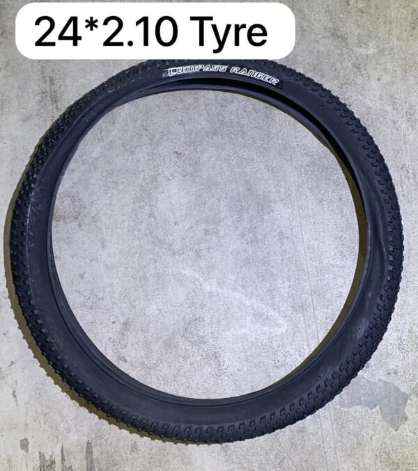 24×2.10 Compass Ranger tire with versatile tread for road and light trail cycling