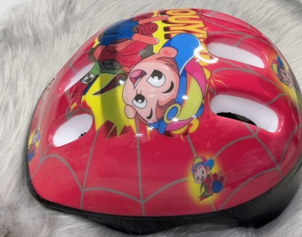 Lightweight pink kids helmet with playful pattern and adjustable straps